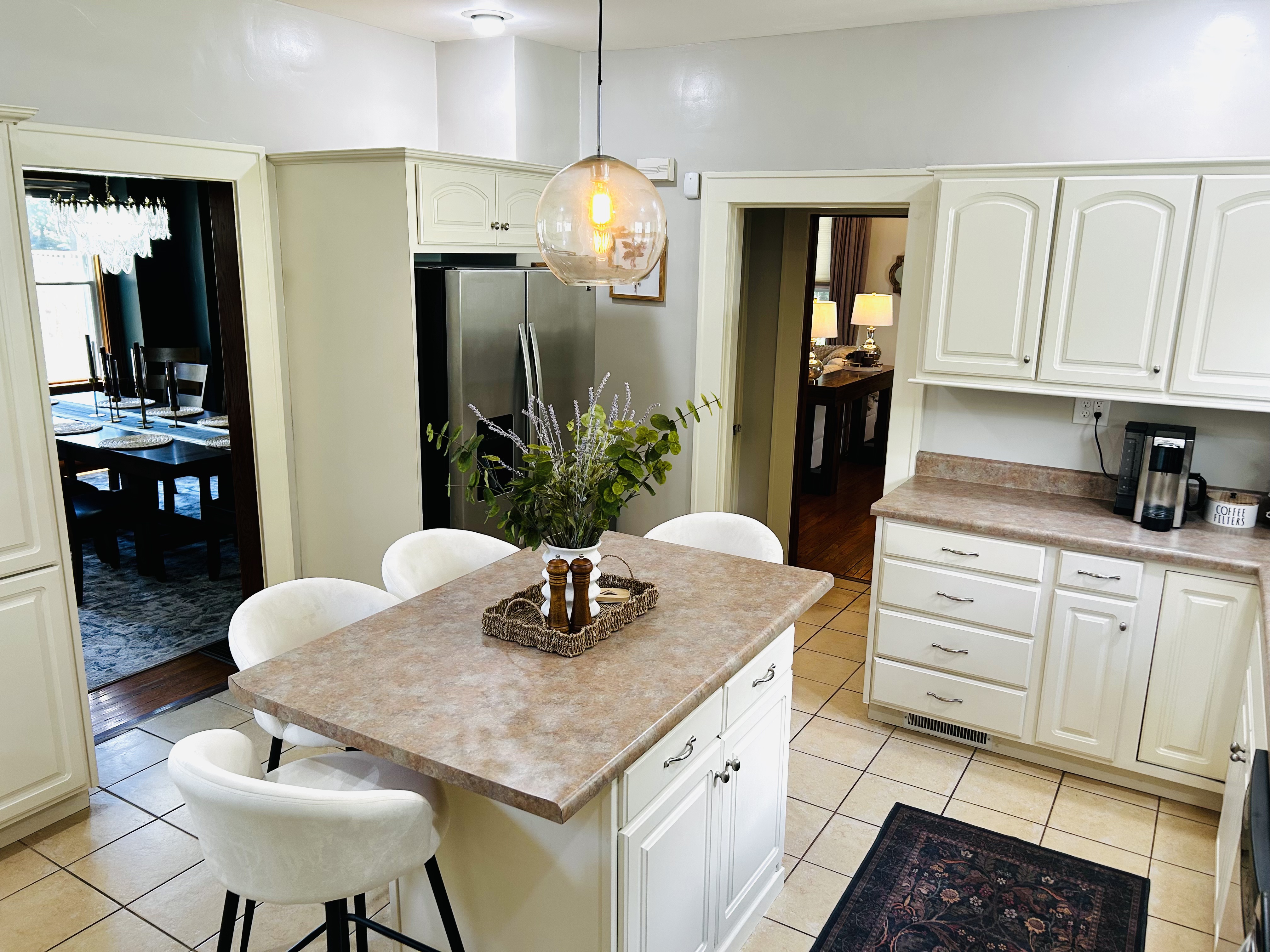 The Mac House — kitchen with island seating for 4